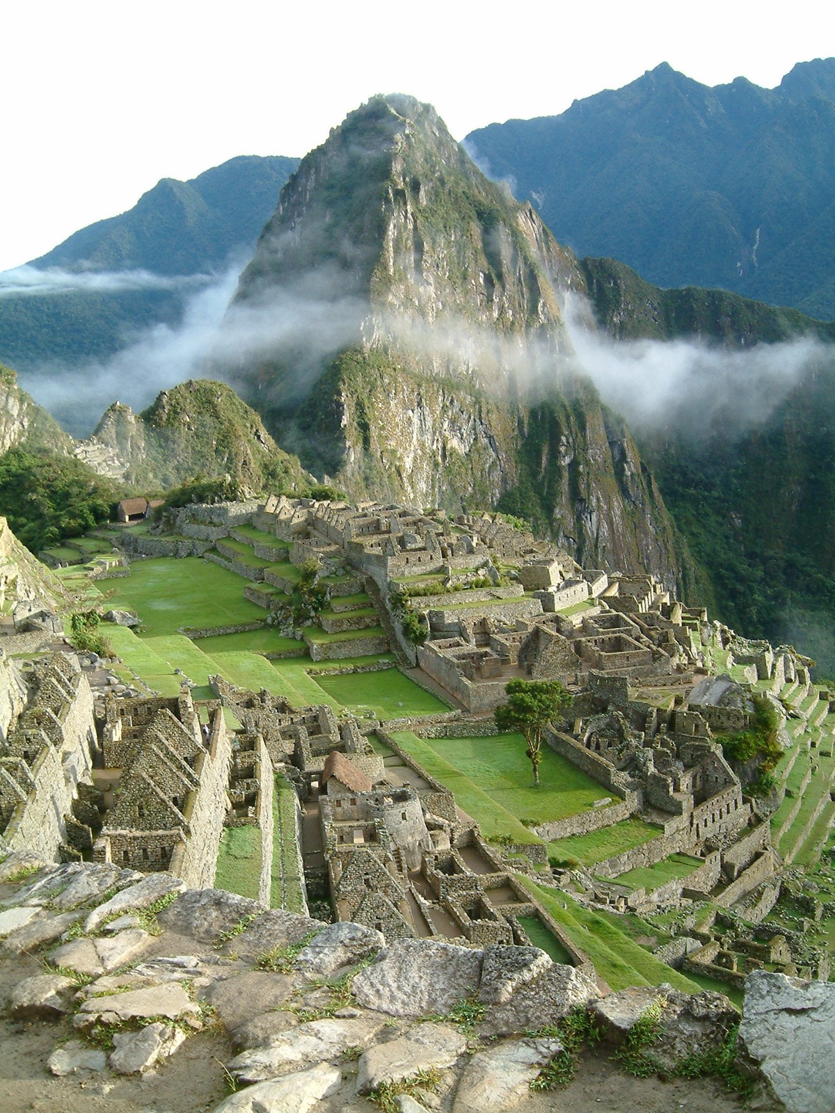 Machu Picchu at sunrise with Huayna Picchu behind